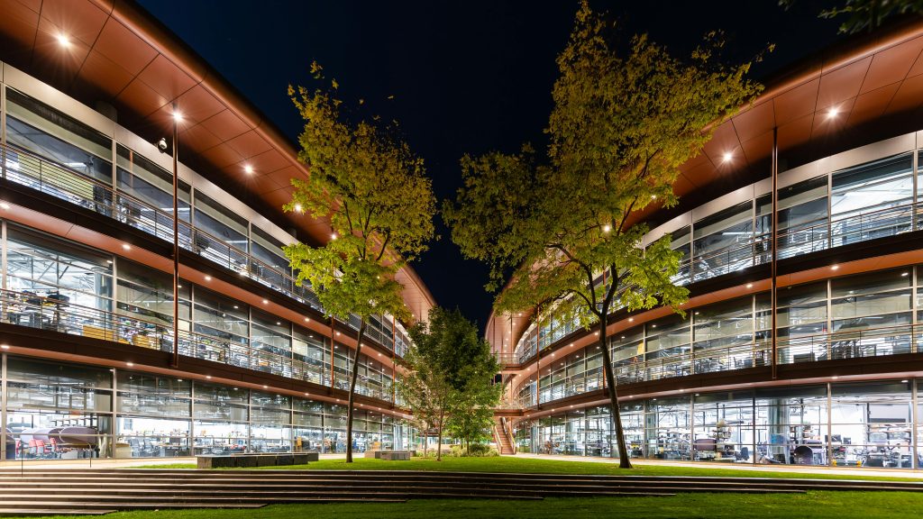 Illuminated view of the James H. Clark Center at Stanford University captured at night.